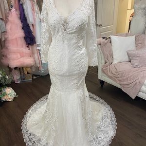 Long sleeve Lace low plunging mermaid wedding gown